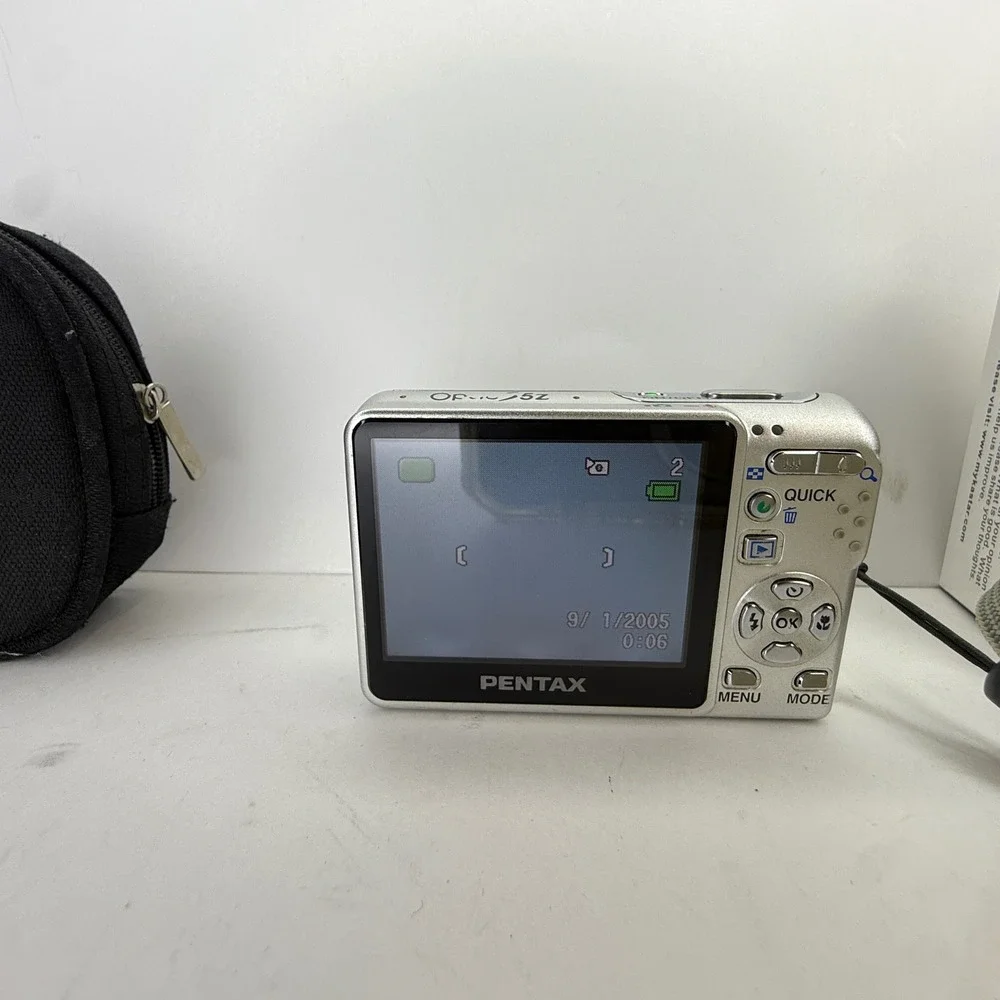 Pentax Optio S5z Silver Digital Camera 5.0MP 3x Zoom Bundle with Charger Case